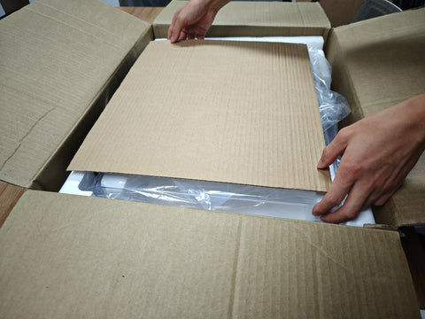 Remove the turntable and speakers from the box