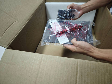 Unpack the power supply and other accessories.